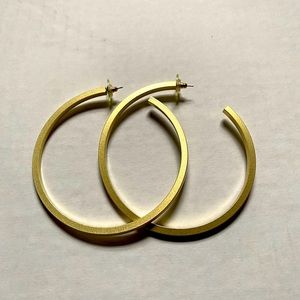 NWOT Gold-plated hoop earrings.  3” diameter.